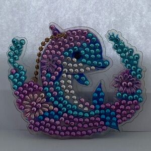 Beaded Dolphin Keychain with Floral Design
